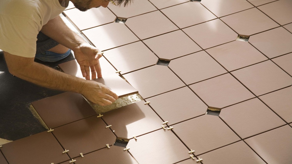 best method to remove grout from tiles of floor