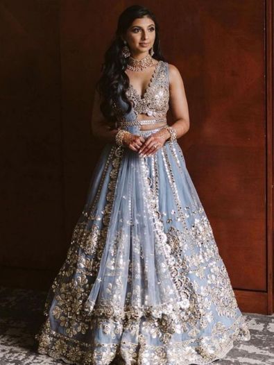 How does the design of a lehenga choli differ for different age groups?